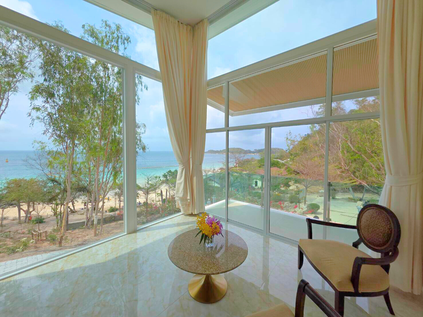Stunning ocean view through the window of the Sea View Room at Ta Yai Beach Resort, Koh Larn